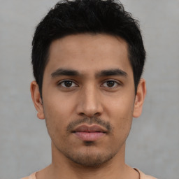 Neutral asian young-adult male with short  black hair and brown eyes