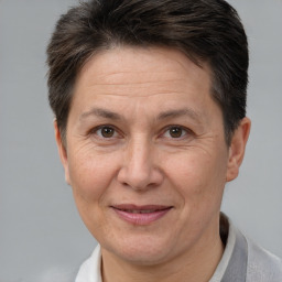 Joyful white adult female with short  brown hair and brown eyes