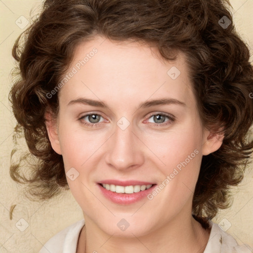 Joyful white young-adult female with medium  brown hair and green eyes