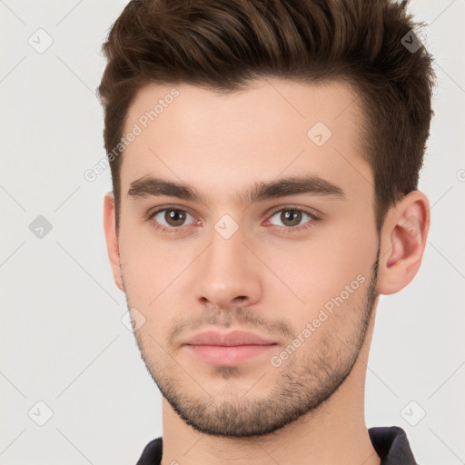 Neutral white young-adult male with short  brown hair and brown eyes