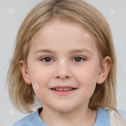 Joyful white child female with medium  brown hair and brown eyes