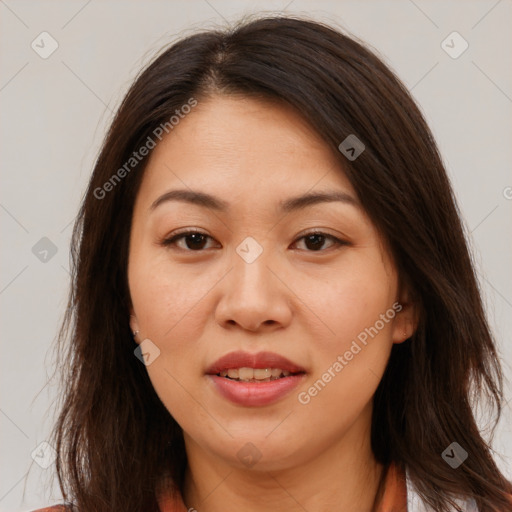 Joyful white adult female with long  brown hair and brown eyes