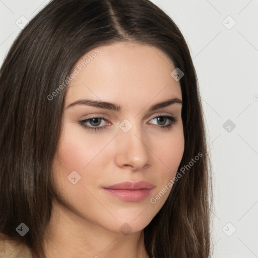 Neutral white young-adult female with long  brown hair and brown eyes