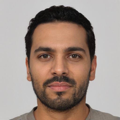 Neutral latino young-adult male with short  black hair and brown eyes