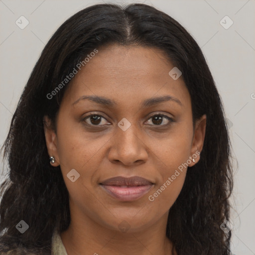 Joyful black young-adult female with long  brown hair and brown eyes