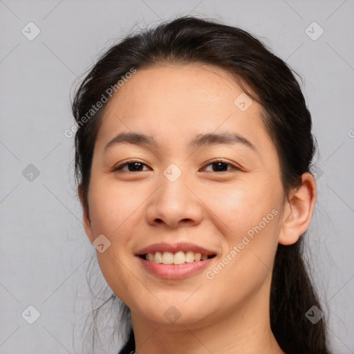 Joyful white young-adult female with medium  brown hair and brown eyes