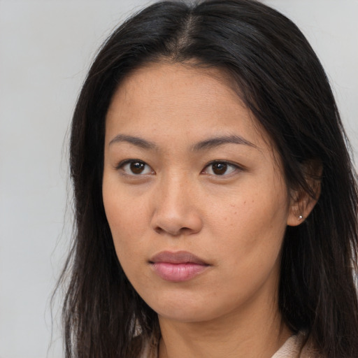Neutral asian young-adult female with long  brown hair and brown eyes