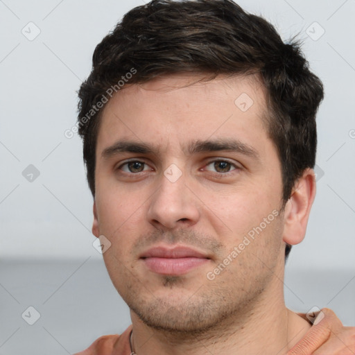 Neutral white young-adult male with short  brown hair and brown eyes