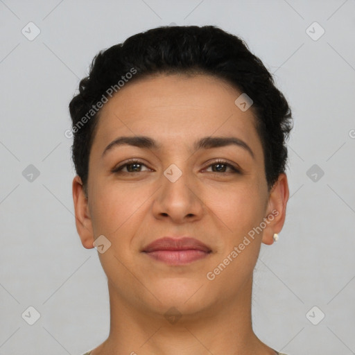 Joyful latino young-adult female with short  black hair and brown eyes