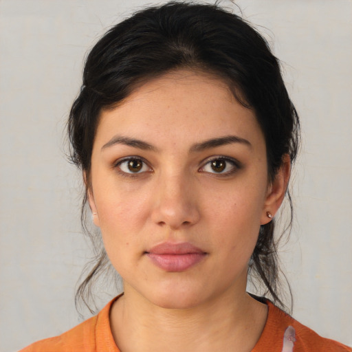 Neutral white young-adult female with medium  brown hair and brown eyes