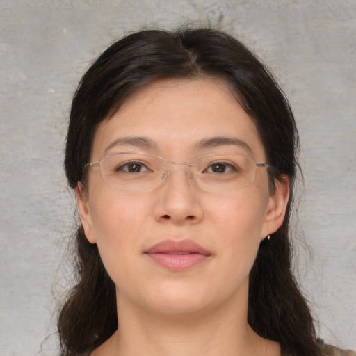 Neutral asian young-adult female with medium  brown hair and brown eyes