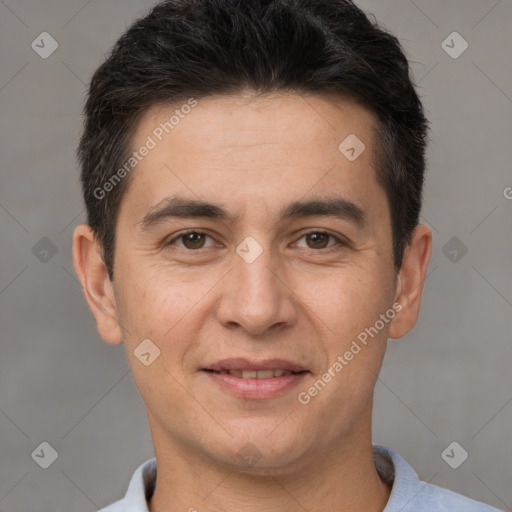 Joyful white adult male with short  brown hair and brown eyes