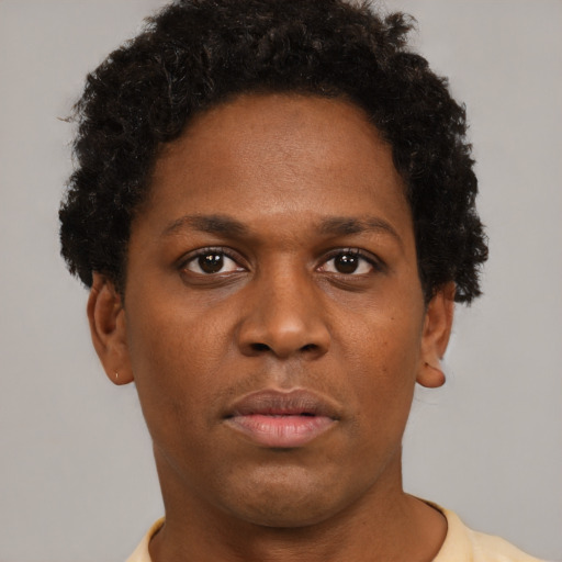 Neutral black young-adult male with short  brown hair and brown eyes