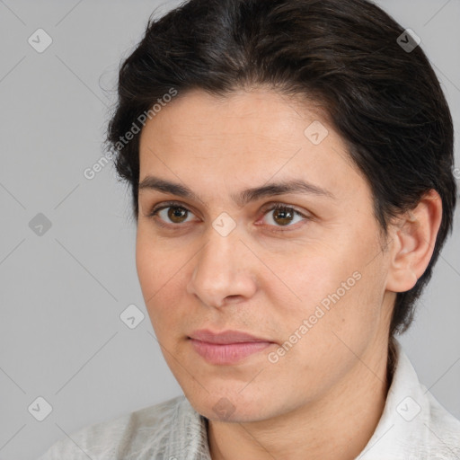 Joyful white adult female with medium  brown hair and brown eyes