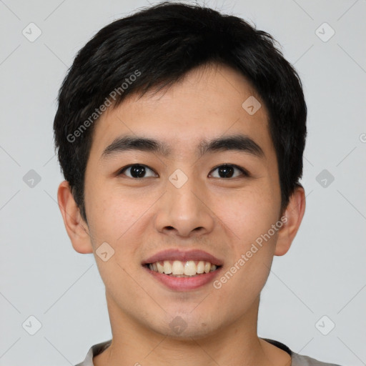 Joyful white young-adult male with short  black hair and brown eyes