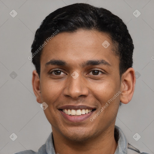 Joyful latino young-adult male with short  black hair and brown eyes