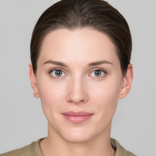 Neutral white young-adult female with short  brown hair and brown eyes