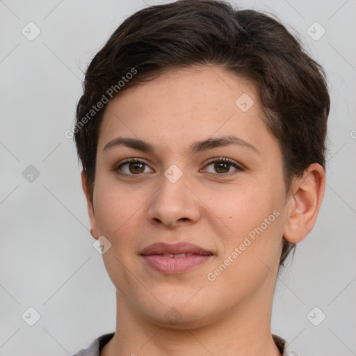 Joyful white young-adult female with short  brown hair and brown eyes