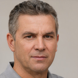 Neutral white middle-aged male with short  brown hair and brown eyes