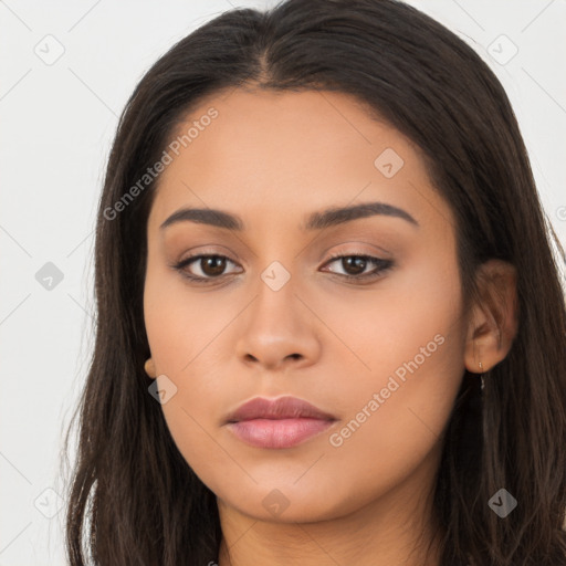 Neutral latino young-adult female with long  brown hair and brown eyes