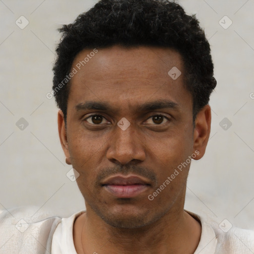 Neutral black young-adult male with short  black hair and brown eyes