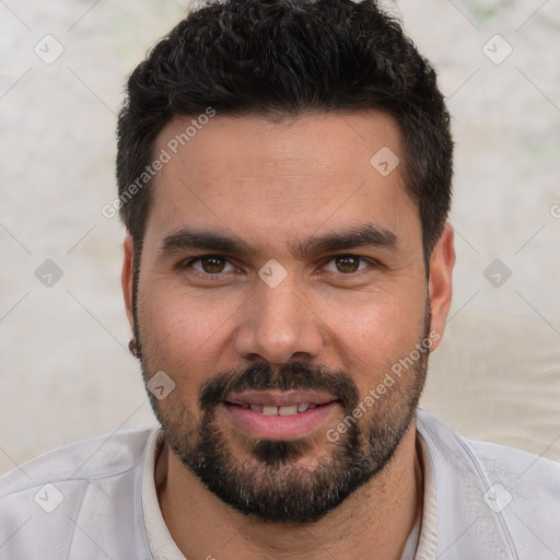 Joyful white young-adult male with short  black hair and brown eyes