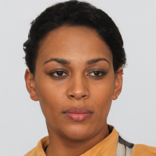 Neutral latino young-adult female with short  black hair and brown eyes