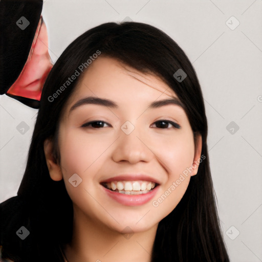 Joyful white young-adult female with long  black hair and brown eyes