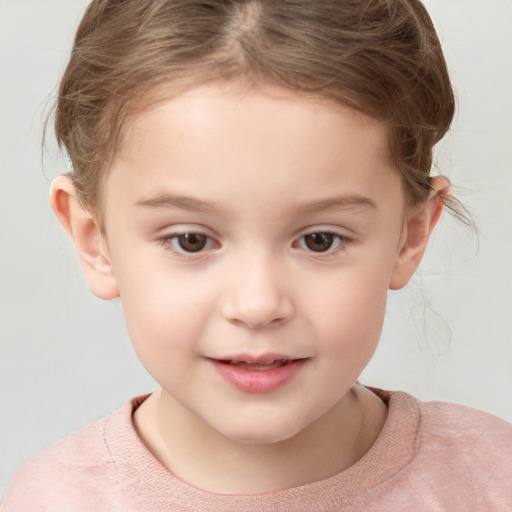 Joyful white child female with short  brown hair and brown eyes