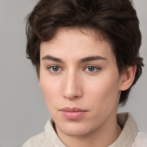 Neutral white young-adult female with short  brown hair and brown eyes