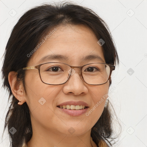 Joyful white adult female with medium  brown hair and brown eyes