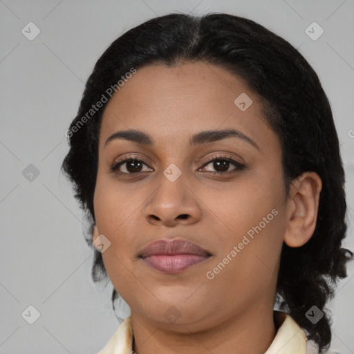 Joyful black young-adult female with medium  brown hair and brown eyes