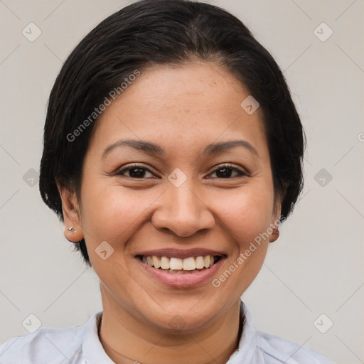 Joyful white young-adult female with short  brown hair and brown eyes