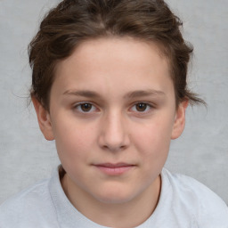 Joyful white child female with short  brown hair and brown eyes