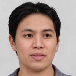 Neutral asian young-adult male with short  brown hair and brown eyes