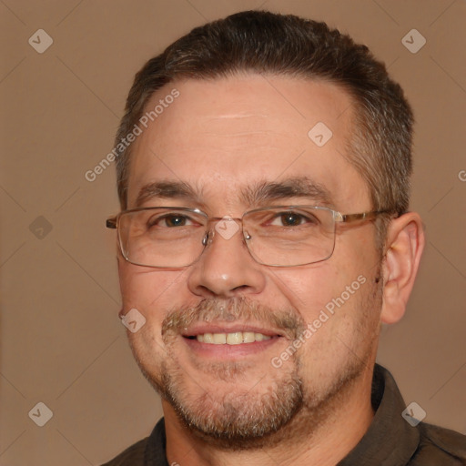 Joyful white adult male with short  brown hair and brown eyes