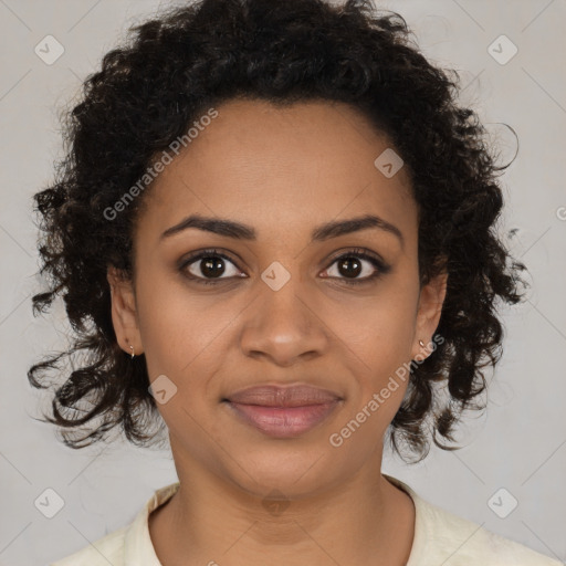 Joyful black young-adult female with medium  brown hair and brown eyes