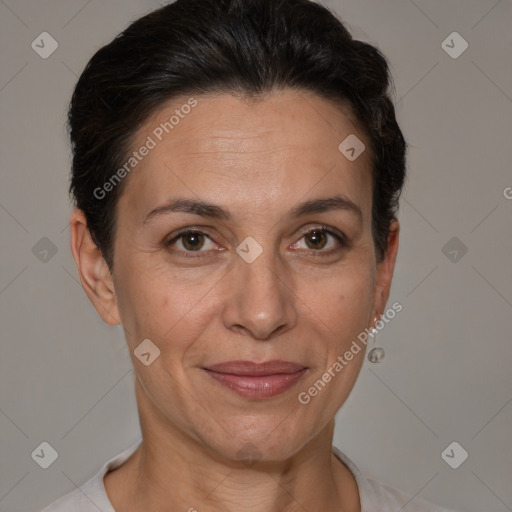 Joyful white adult female with short  brown hair and brown eyes