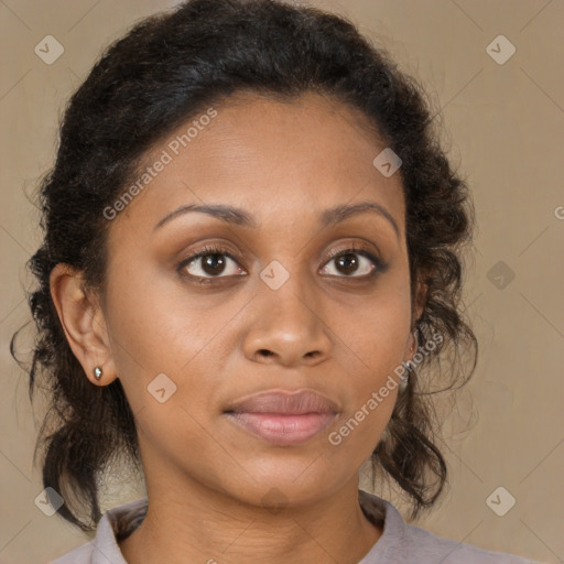 Joyful latino adult female with medium  brown hair and brown eyes