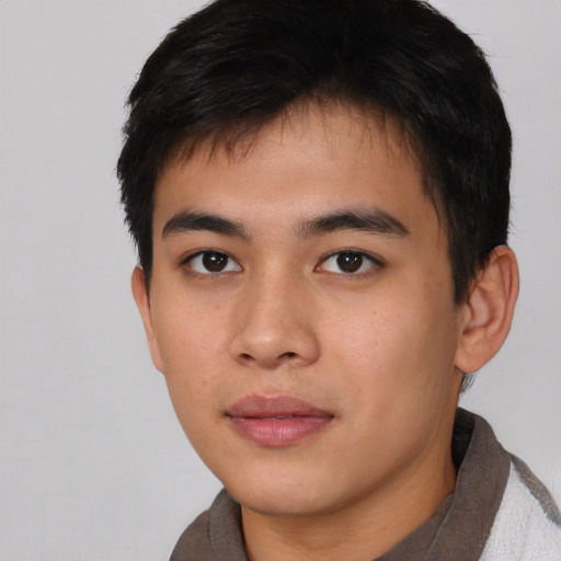 Neutral asian young-adult male with short  black hair and brown eyes