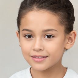 Joyful white child female with short  brown hair and brown eyes