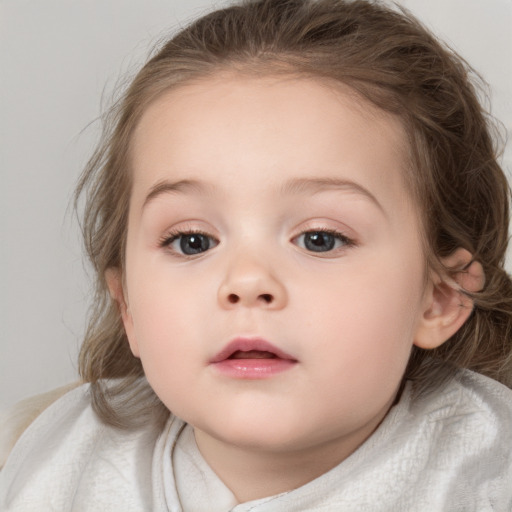 Neutral white child female with medium  brown hair and blue eyes