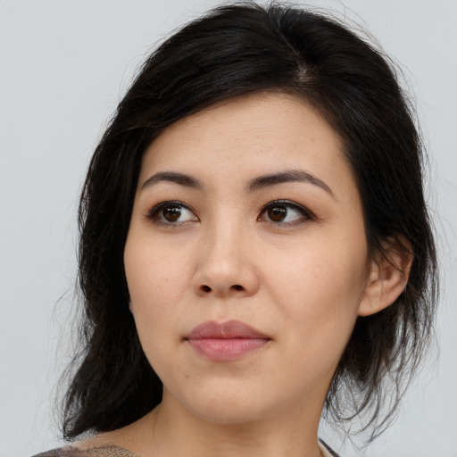 Neutral asian young-adult female with medium  brown hair and brown eyes
