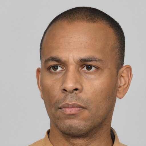 Neutral black adult male with short  black hair and brown eyes
