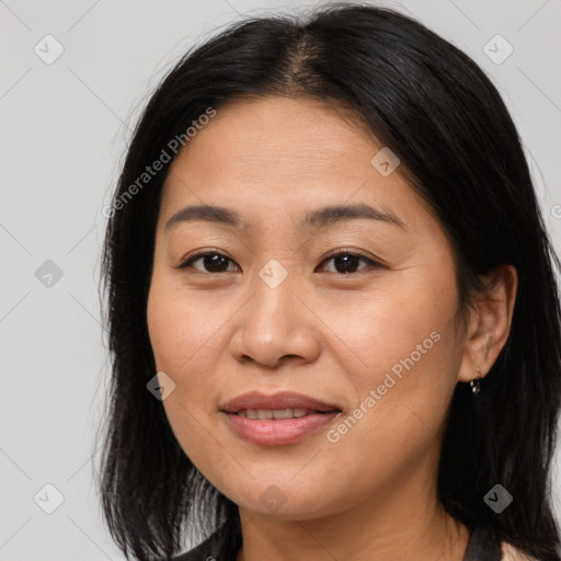 Joyful asian young-adult female with medium  brown hair and brown eyes