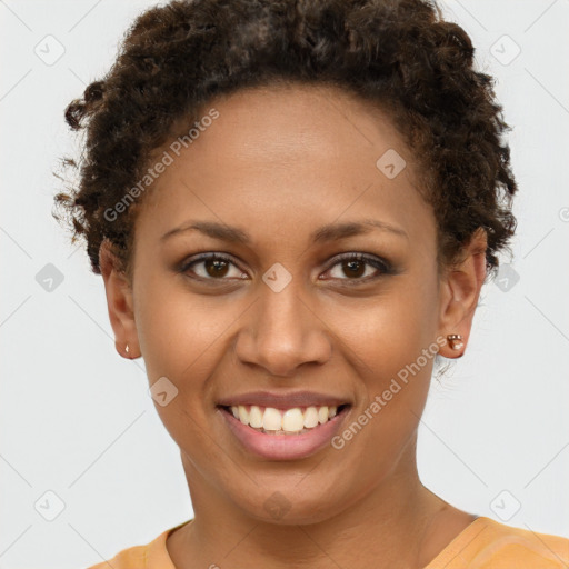 Joyful black young-adult female with short  brown hair and brown eyes