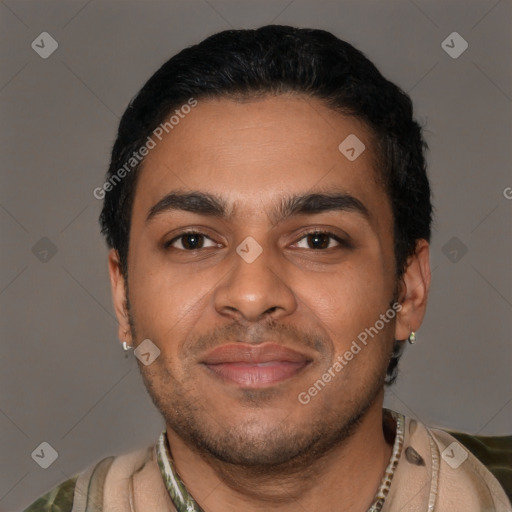 Joyful latino young-adult male with short  black hair and brown eyes