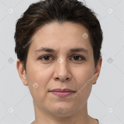 Joyful white adult female with short  brown hair and brown eyes