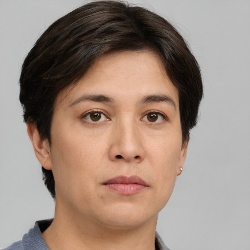 Neutral white young-adult female with short  brown hair and brown eyes