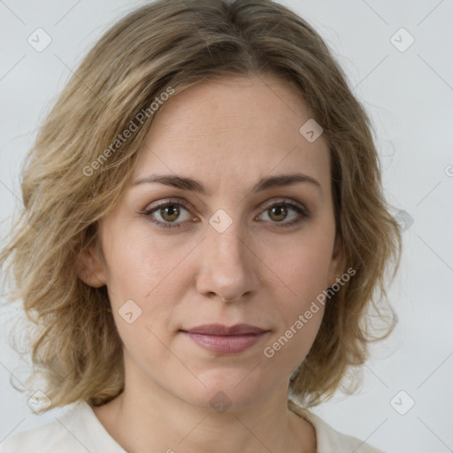 Joyful white young-adult female with medium  brown hair and green eyes